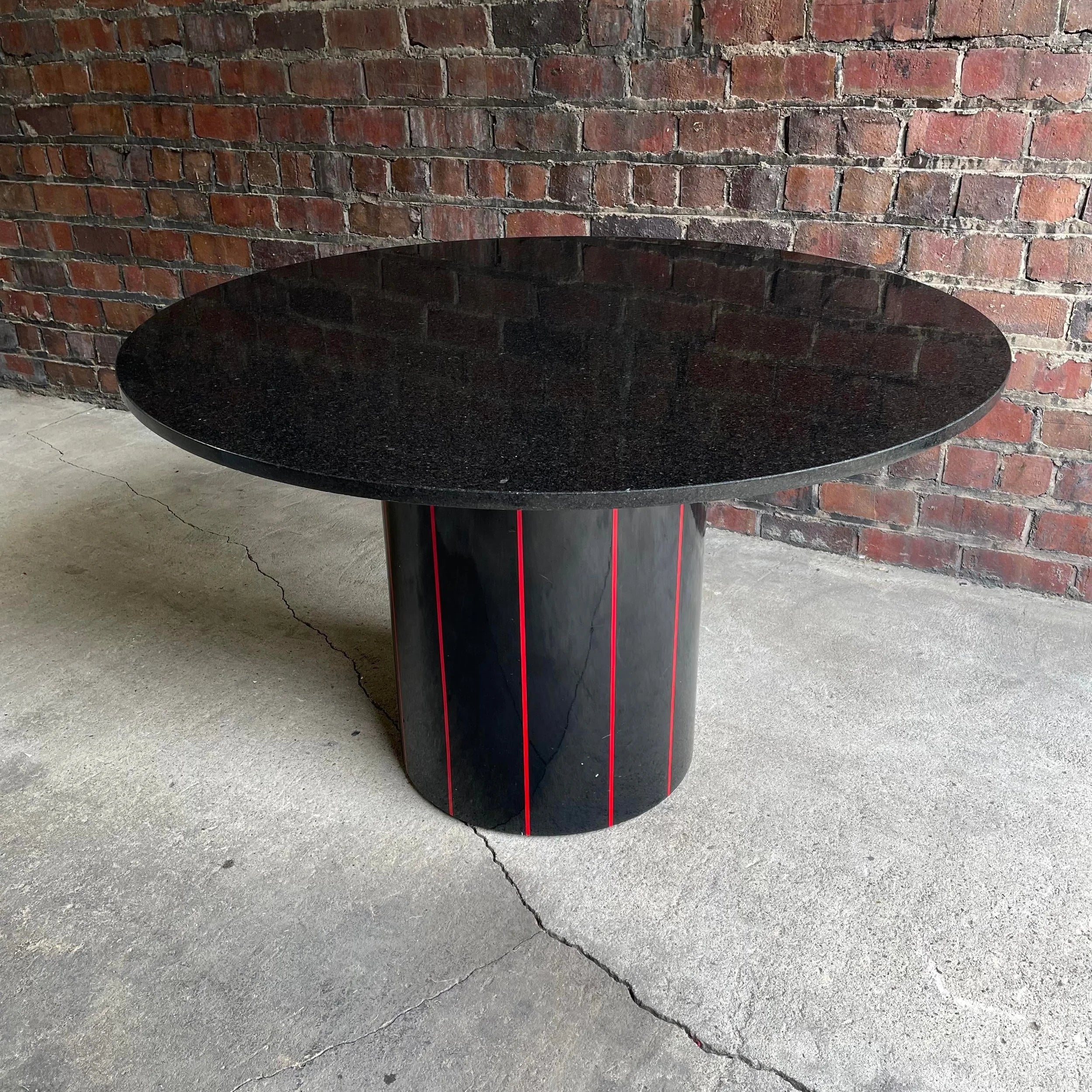 1980s Black Round Stone Table Top With Red Strips on Black Laminate Base Round
