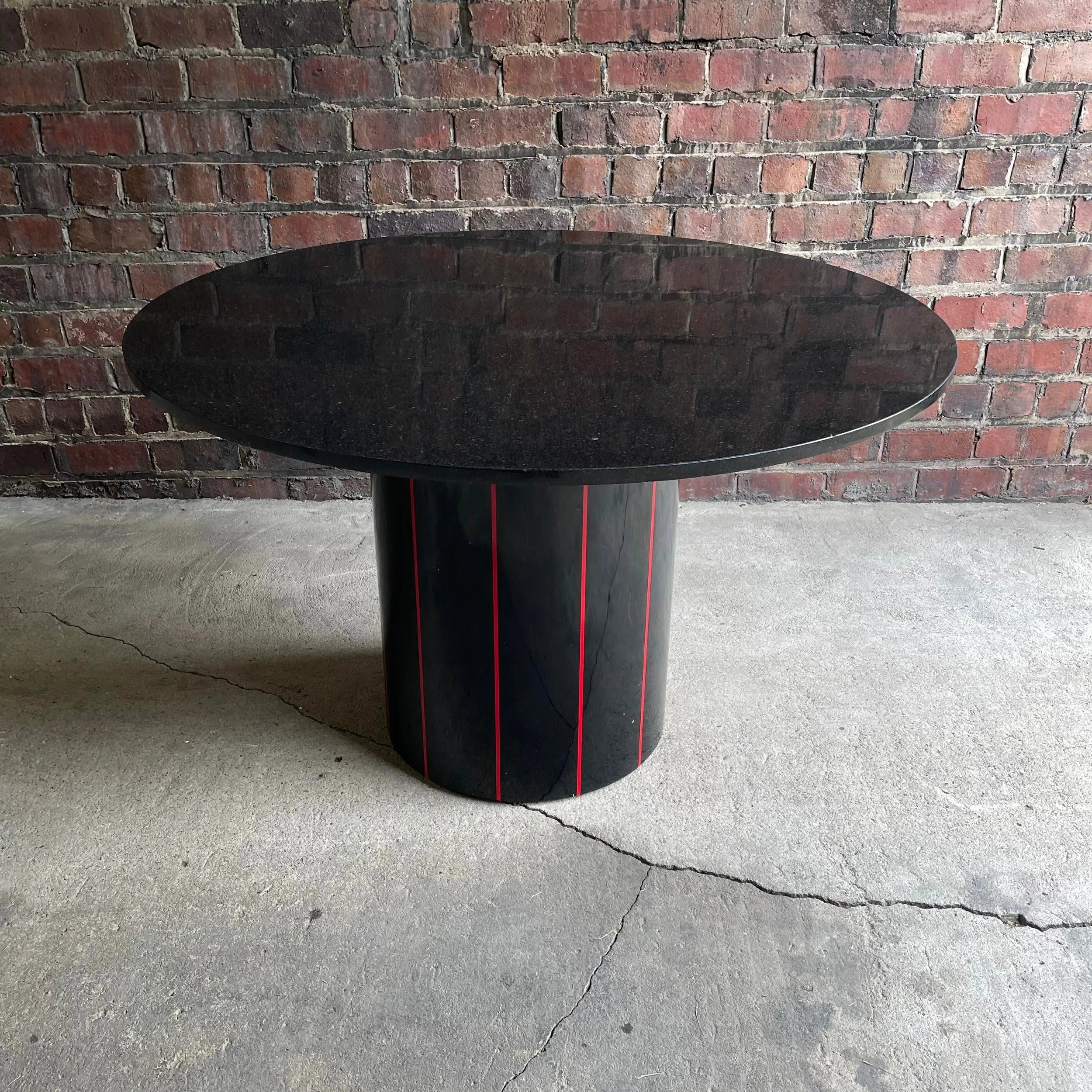 1980s Black Round Stone Table Top With Red Strips on Black Laminate Base Round