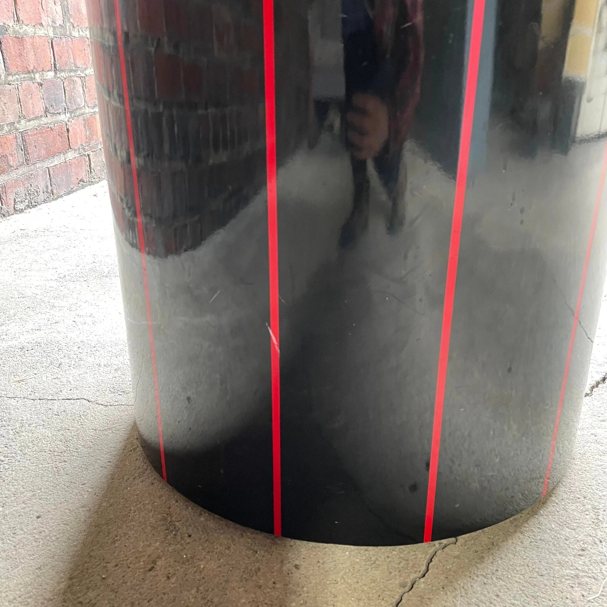 1980s Black Round Stone Table Top With Red Strips on Black Laminate Base Round