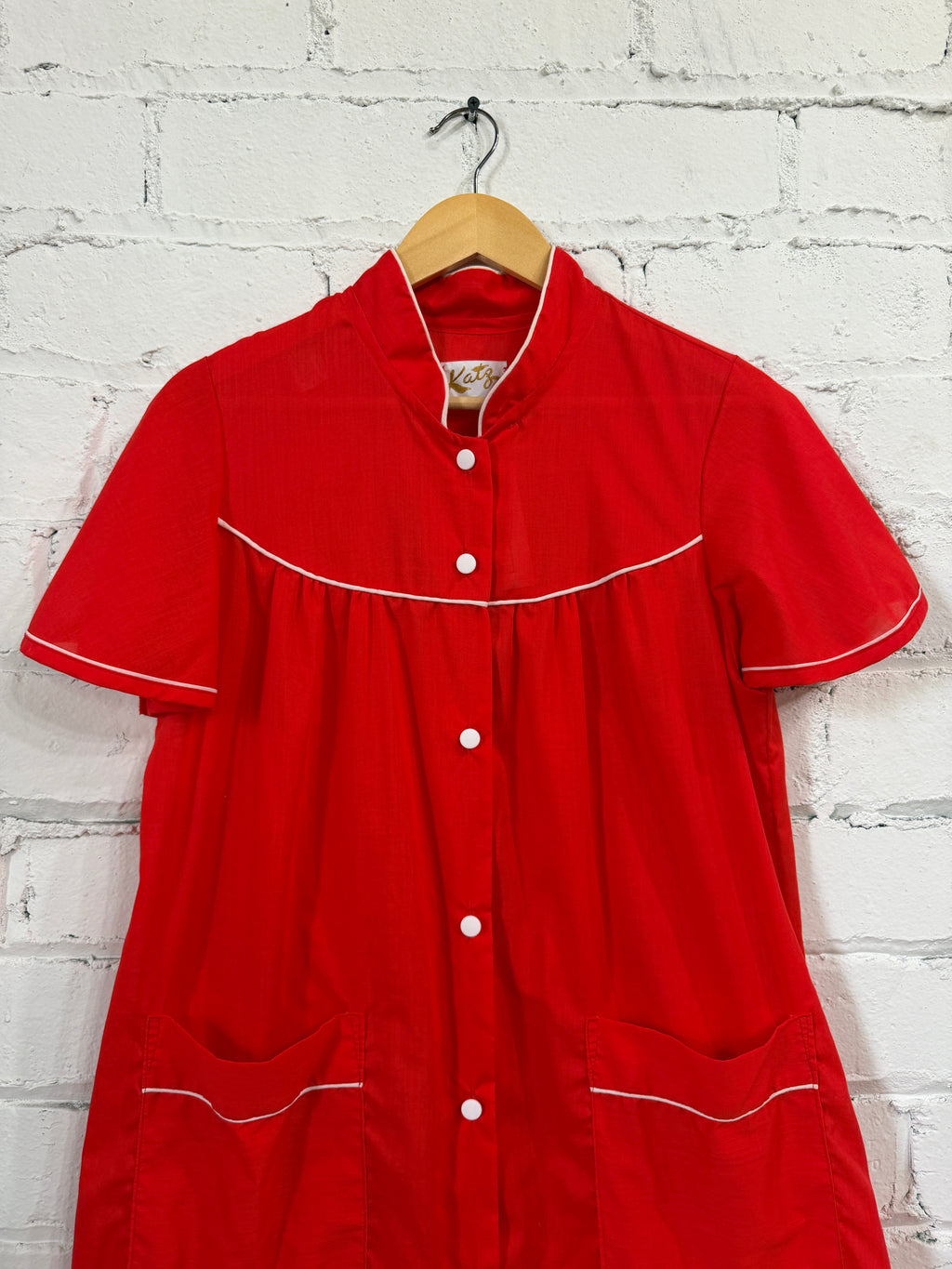 Red button up house dress