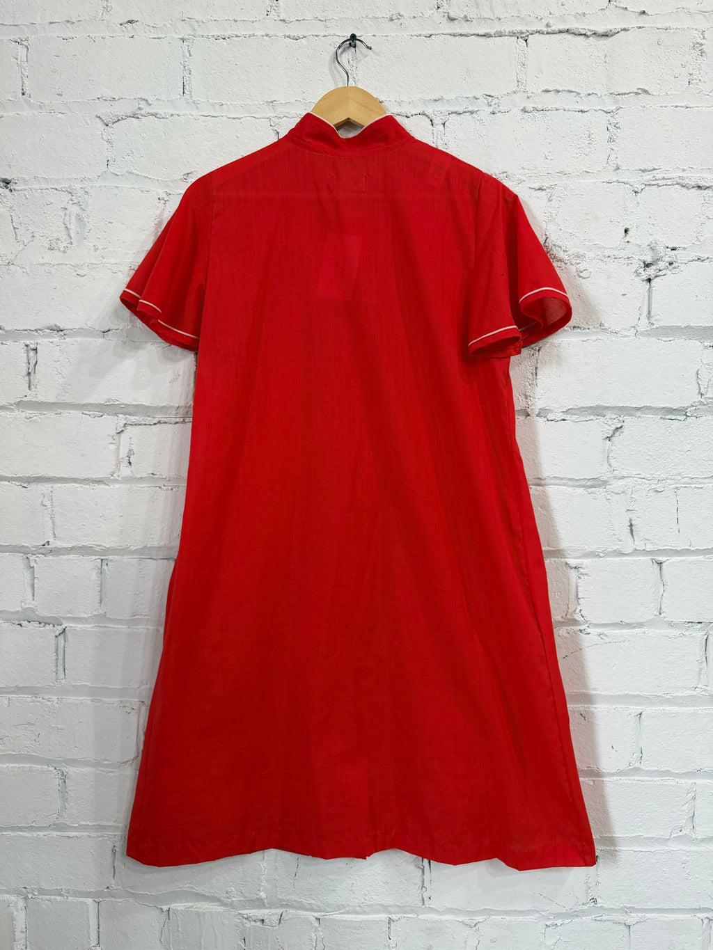Red button up house dress
