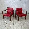 Mid Century Modern Pair of Red Vinyl Arm Chairs