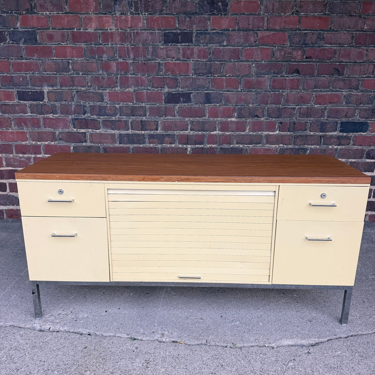 Steelcase Mid Century Modern 4 Drawer Tanker Credenza With a Center Tambour Door