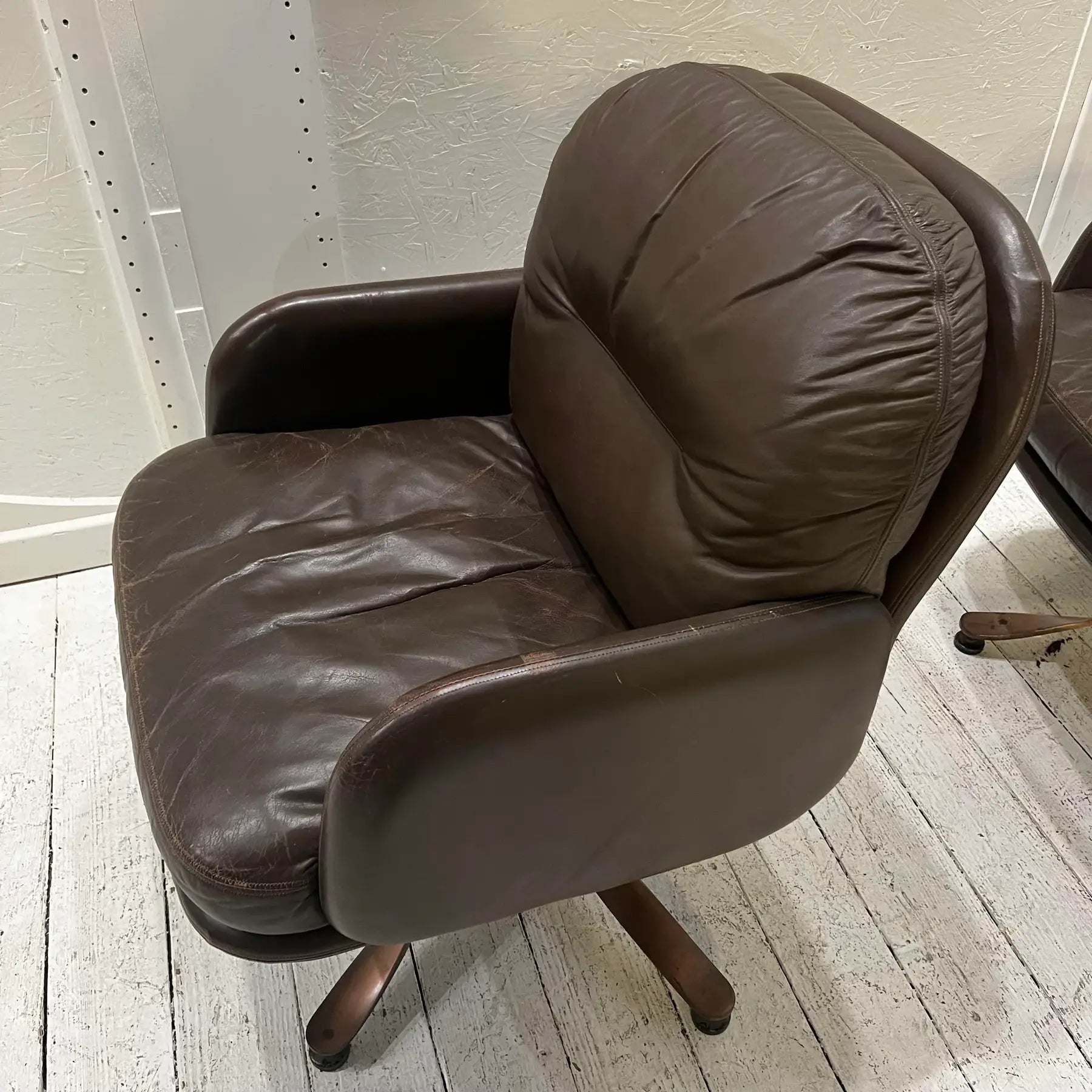 Brown Leather and Brass Propeller Base Arm Chairs by Mueller Furniture