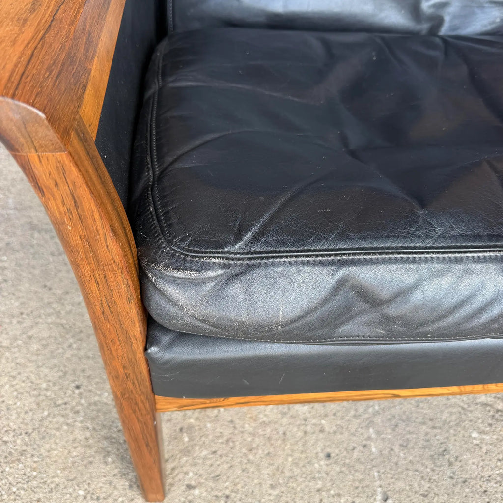 Knud Sæter Mid-Century Rosewood and Black Leather Lounge Chair and Ottoman