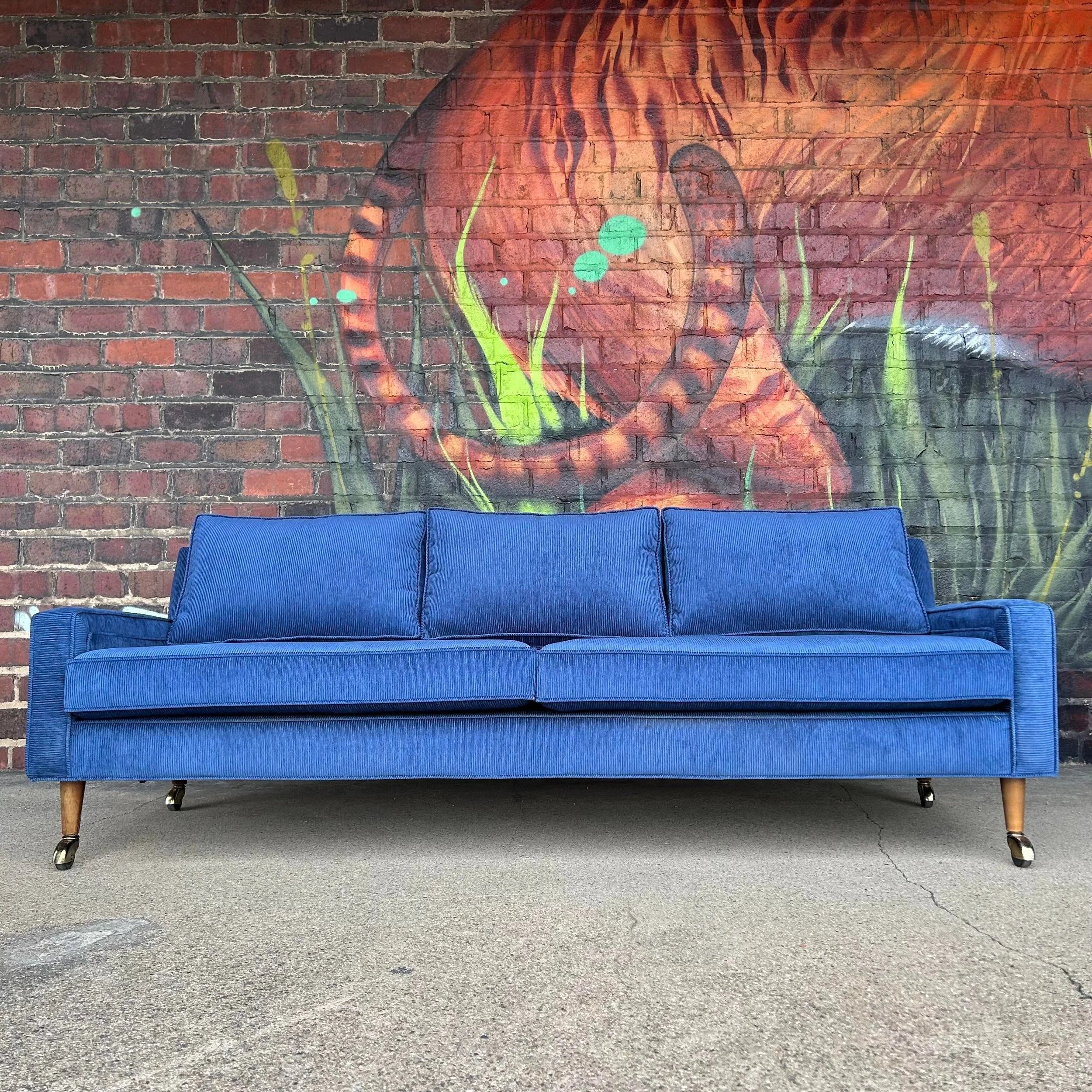 Reupholstered Blue Corduroy sofa on Casters Selig Style