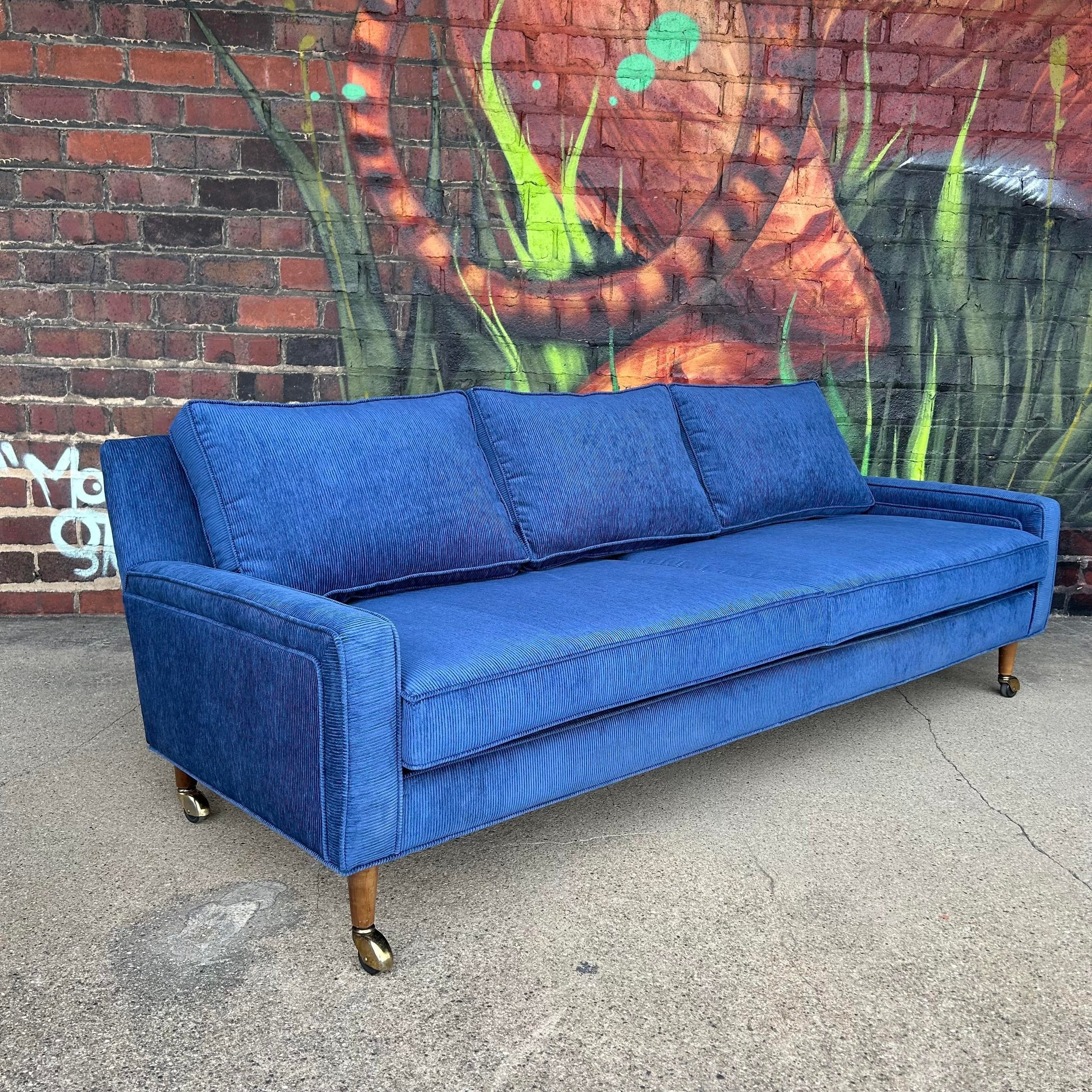 Reupholstered Blue Corduroy sofa on Casters Selig Style