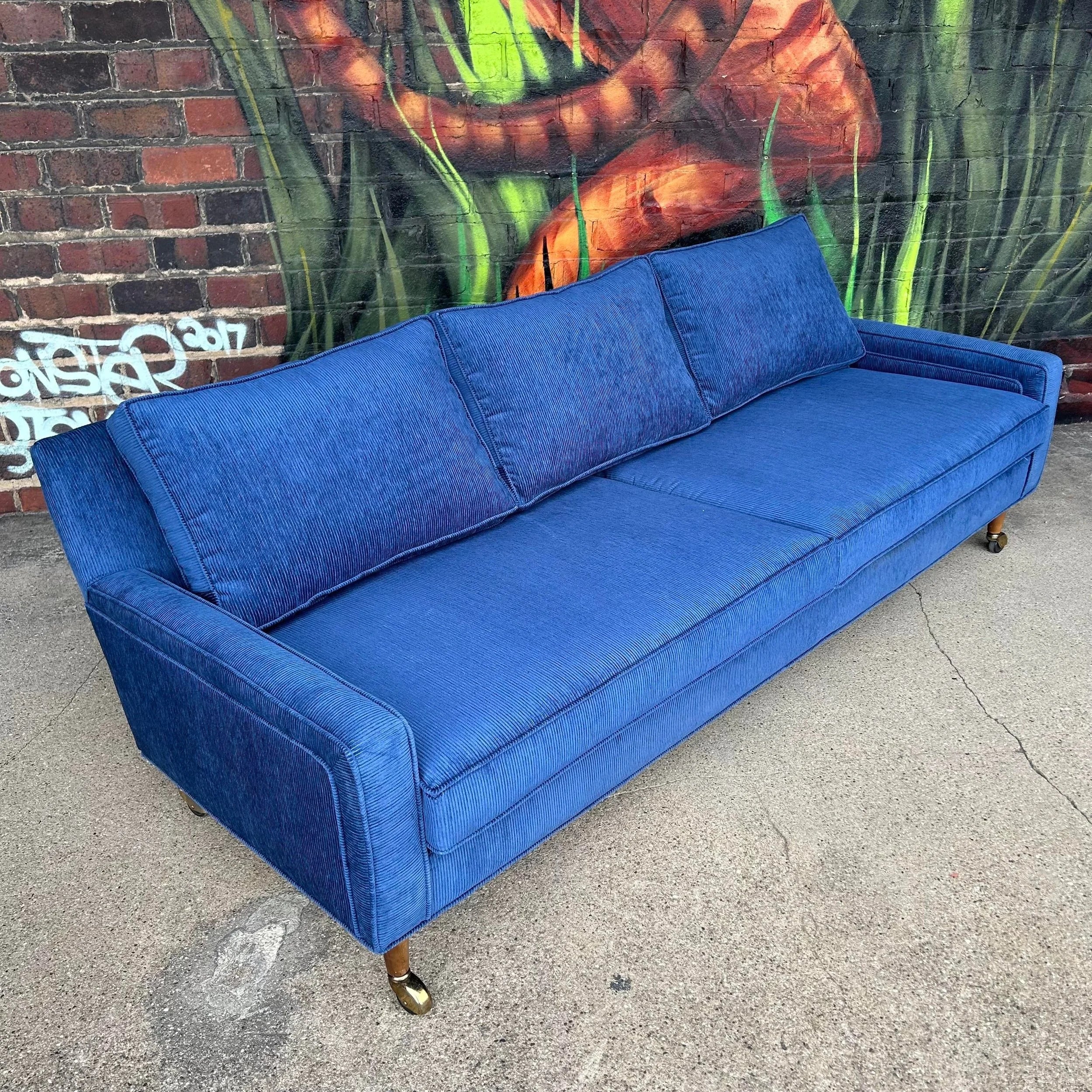 Reupholstered Blue Corduroy sofa on Casters Selig Style