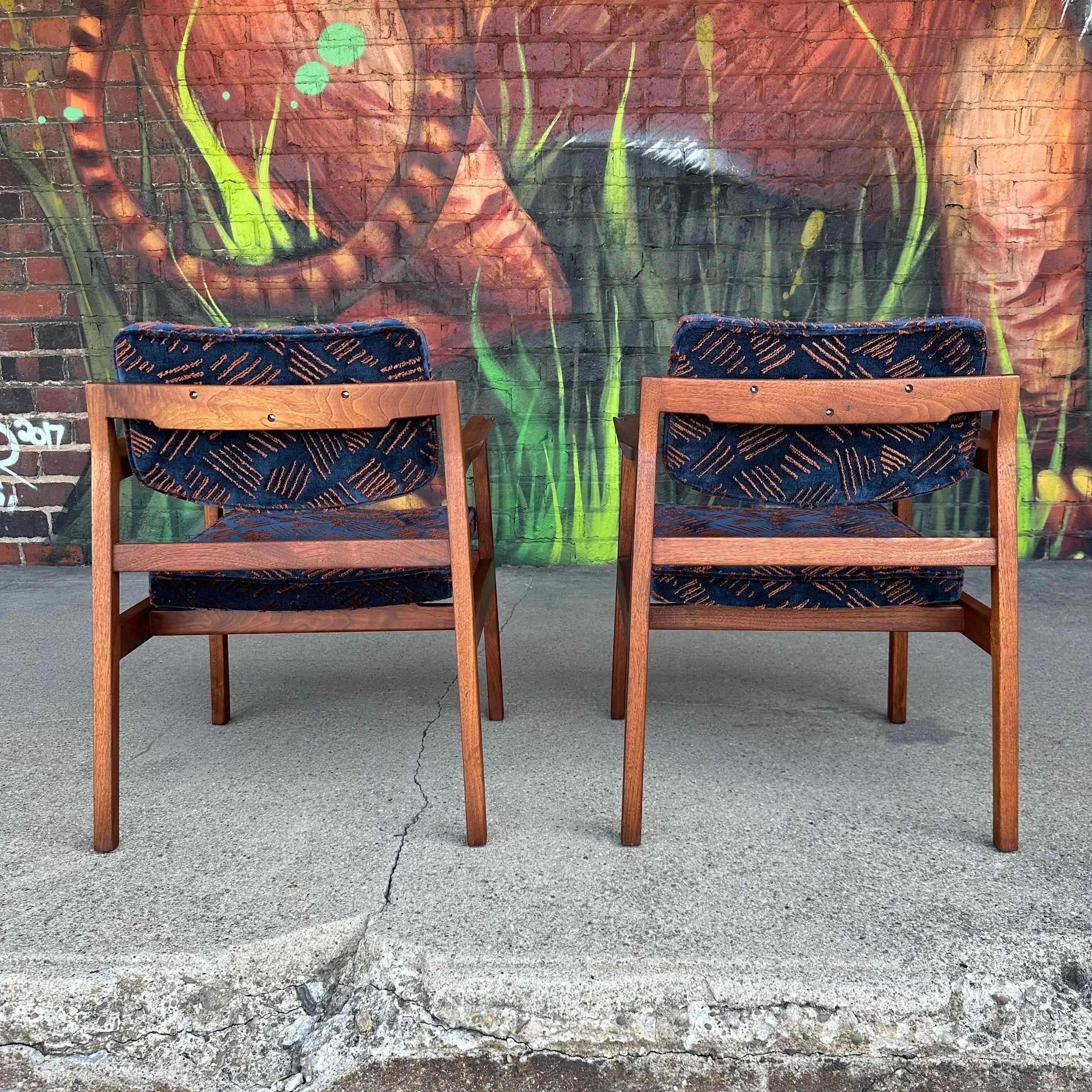 Pair of Walnut Jens Risom Arm Chairs Newly Upholstered in Jack Lenor Larsen Fabric