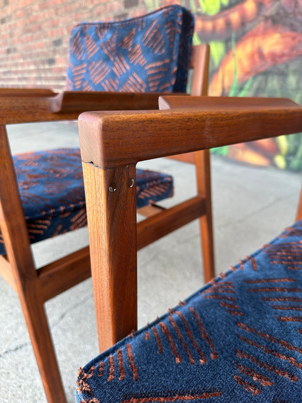 Pair of Walnut Jens Risom Arm Chairs Newly Upholstered in Jack Lenor Larsen Fabric